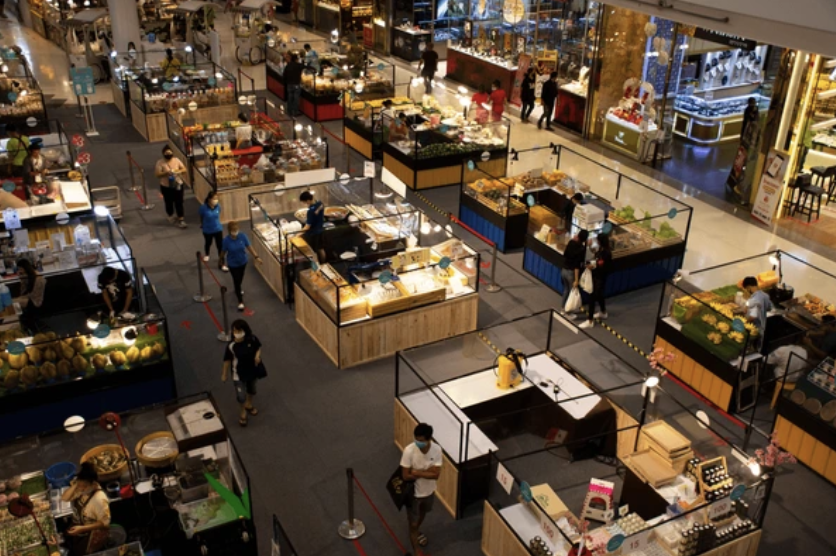 Aerial view of a bustling food trade show exhibition floor